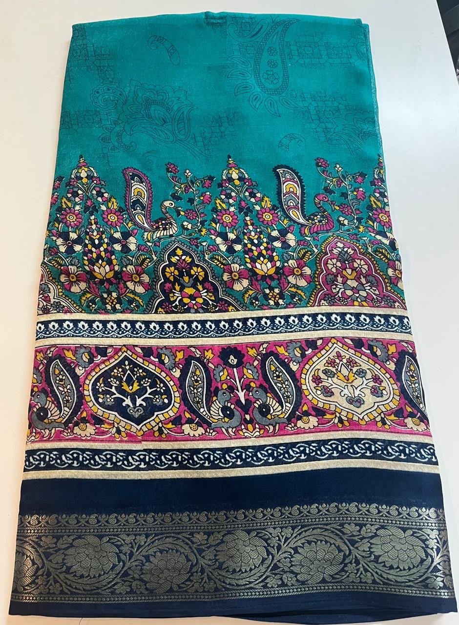 Elegant teal Amisha Silk saree with a deep navy contrast blouse - Image 2