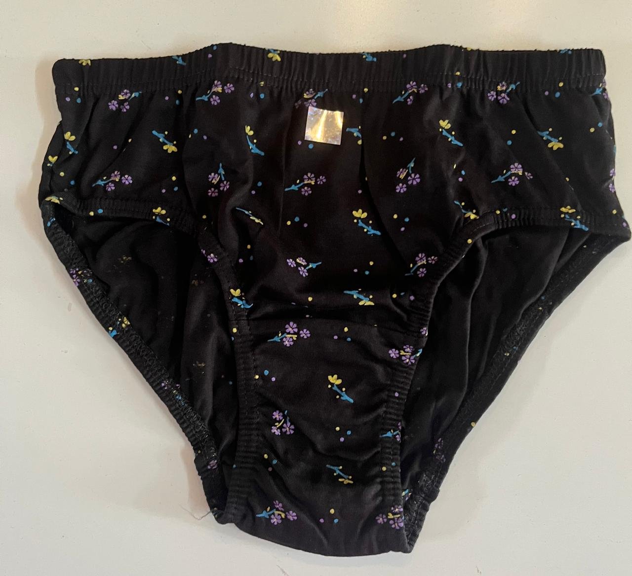 Dissa women's panty in black with a multicolour floral and abstract print - Image 2